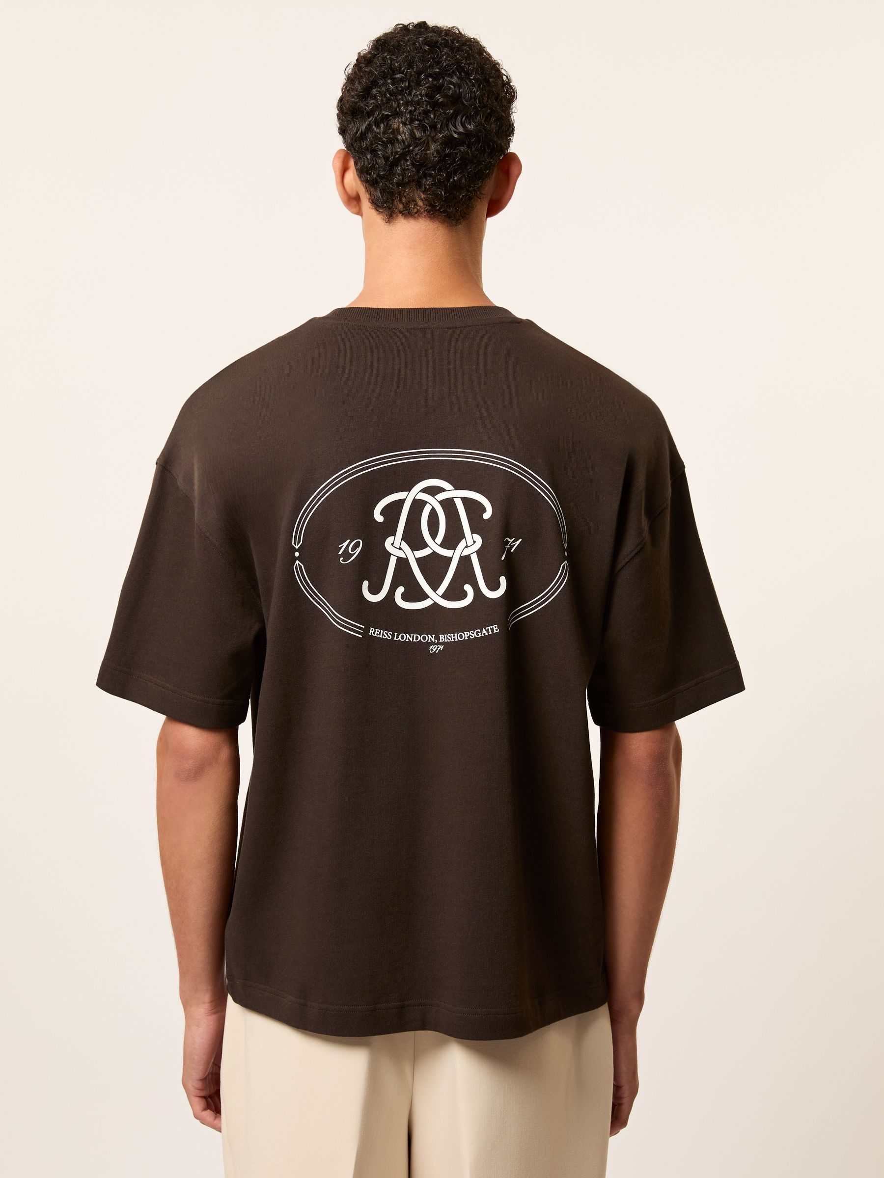 Monogram Print Cotton Oversized T-Shirt in Brown