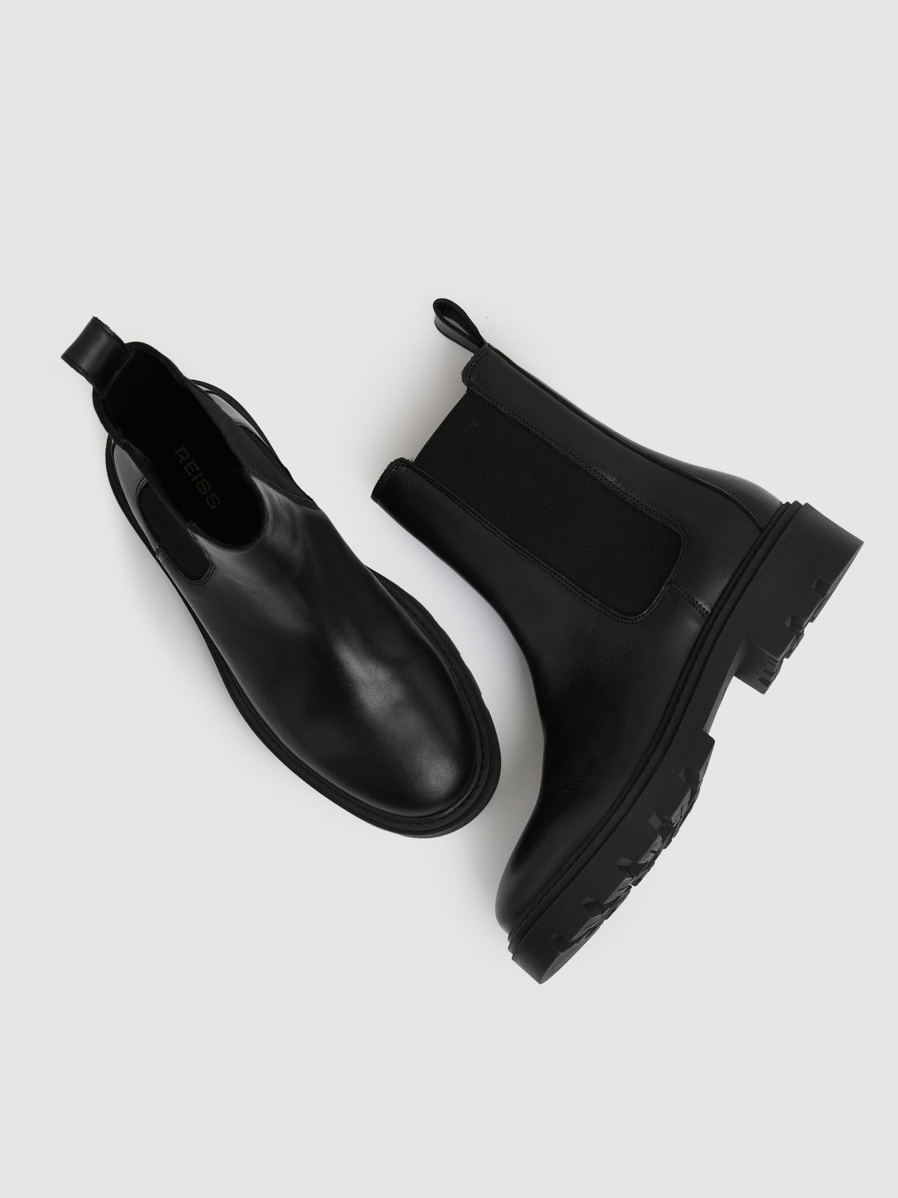 Leather Cleated Sole Chelsea Boots in Black