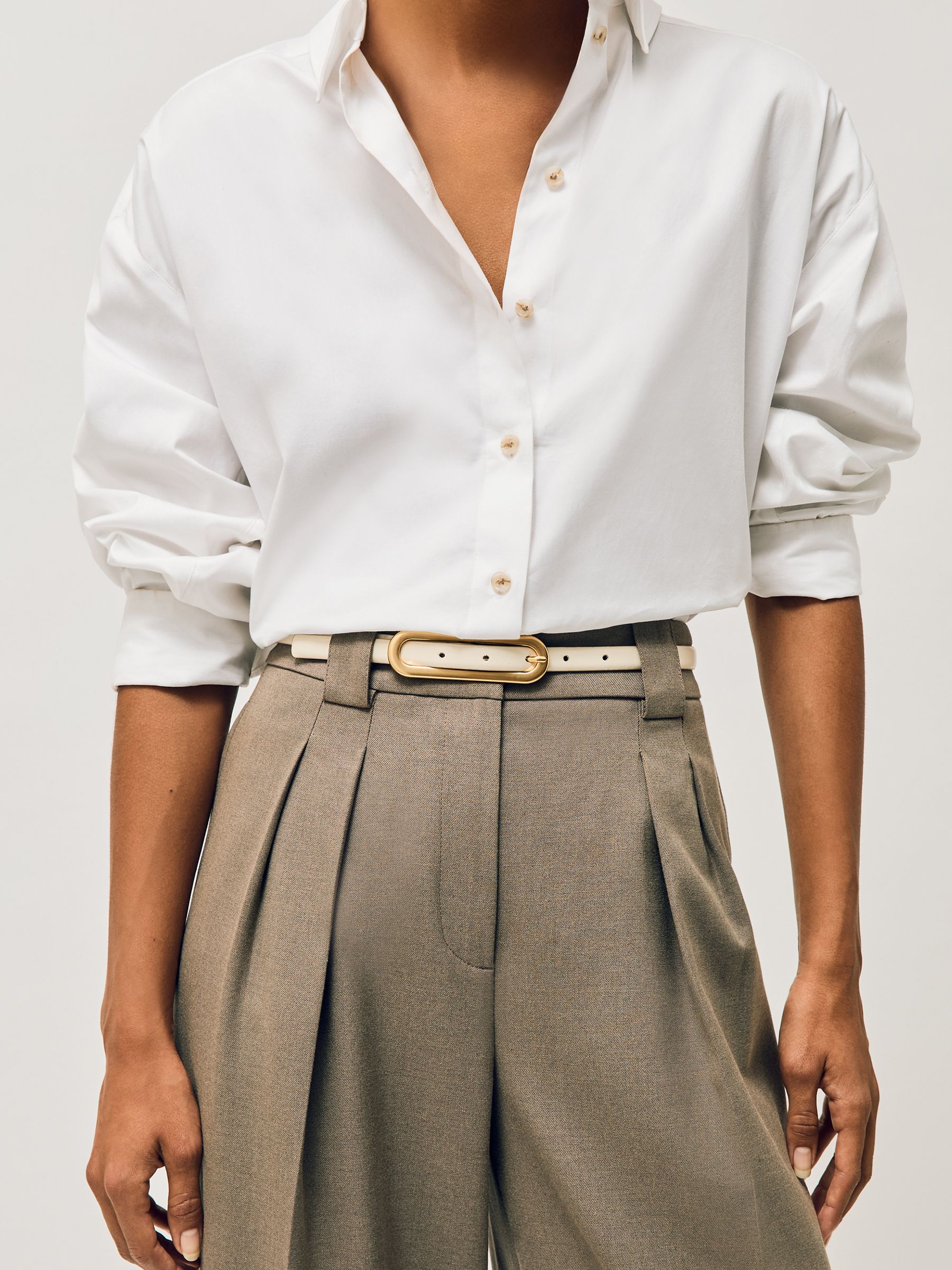 Thin Leather Elongated Buckle Belt in Black Snakeskin