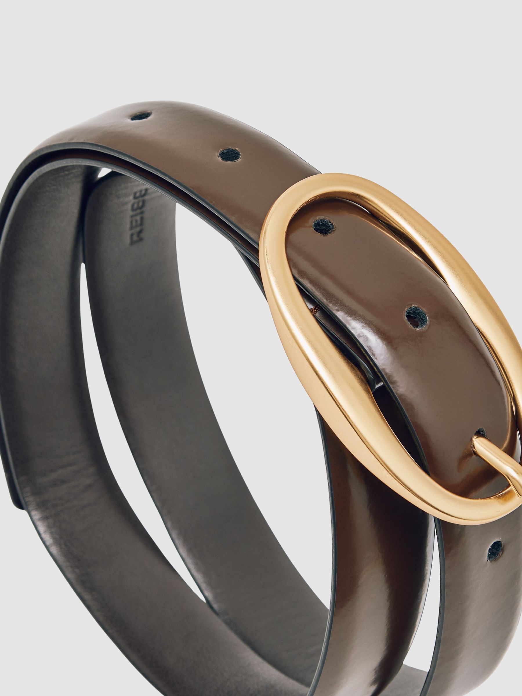 Patent Leather Oval Buckle Belt in Chocolate