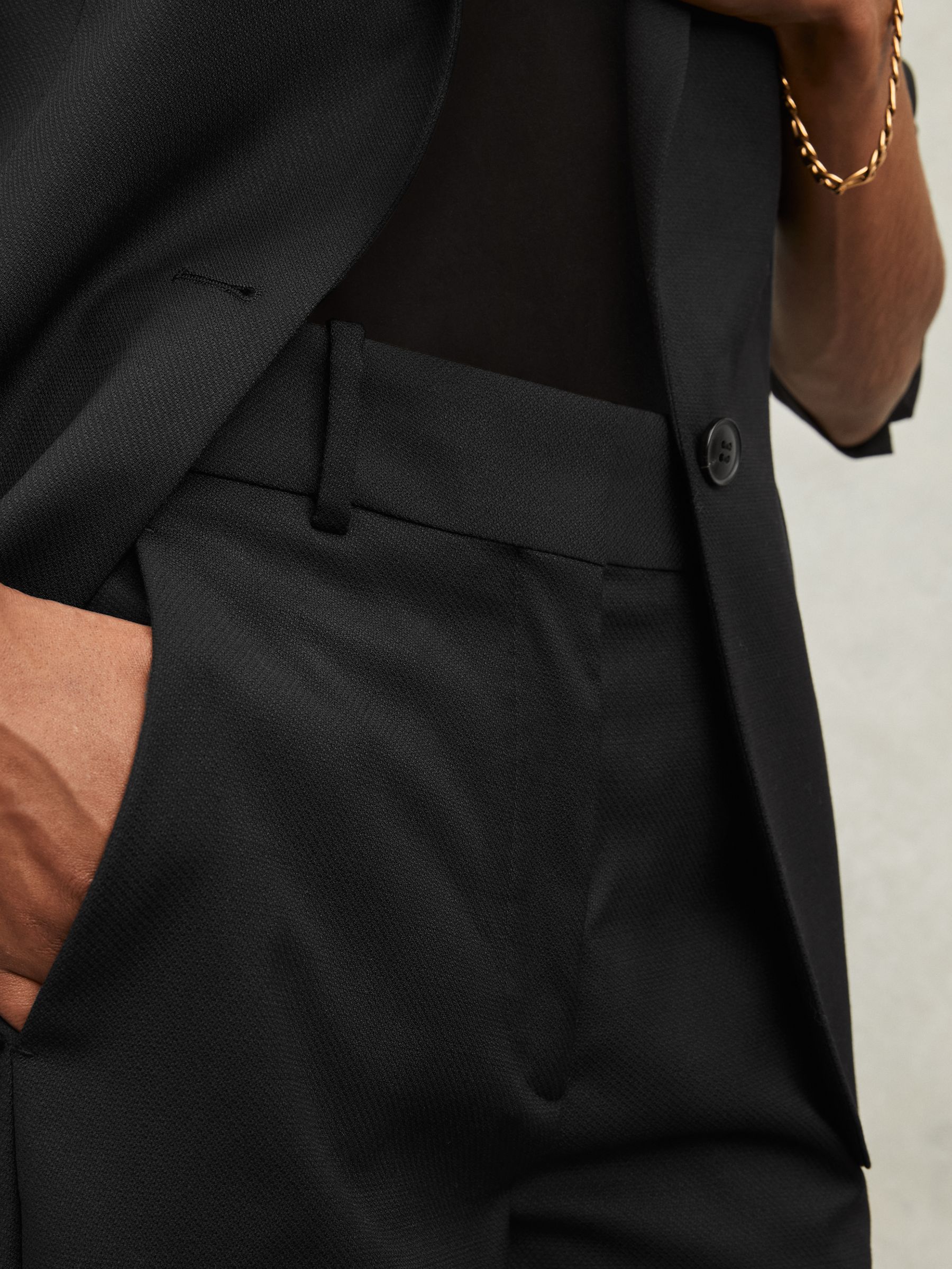 Wool-Blend Tailored Flared Suit Trousers in Black