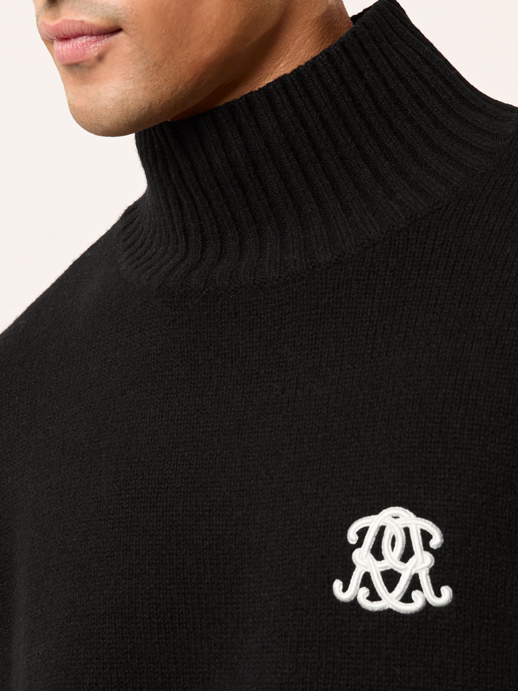 Monogram Wool Relaxed Jumper in Black
