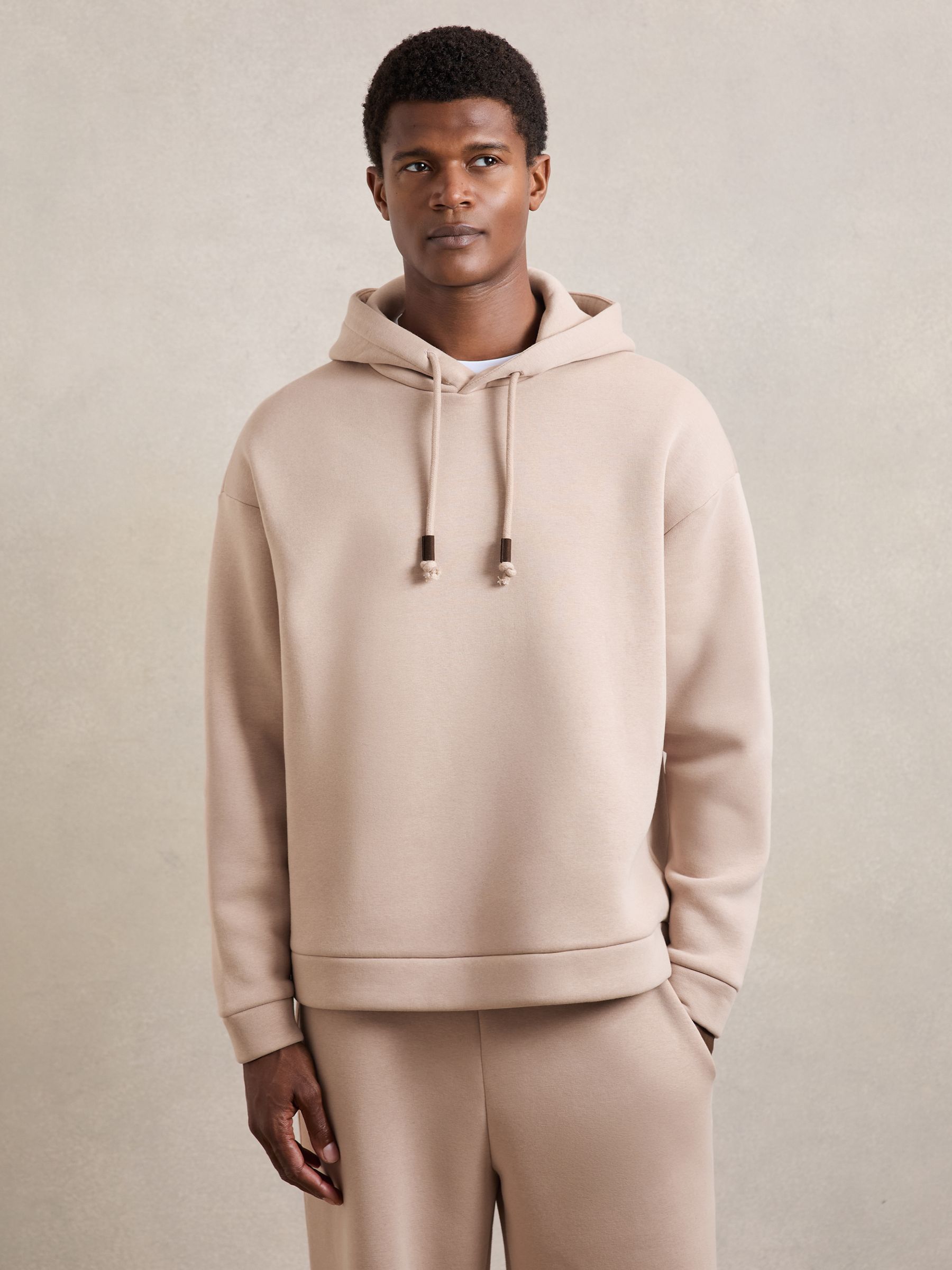 Cotton-Blend Fleece-Back Hoodie in Black