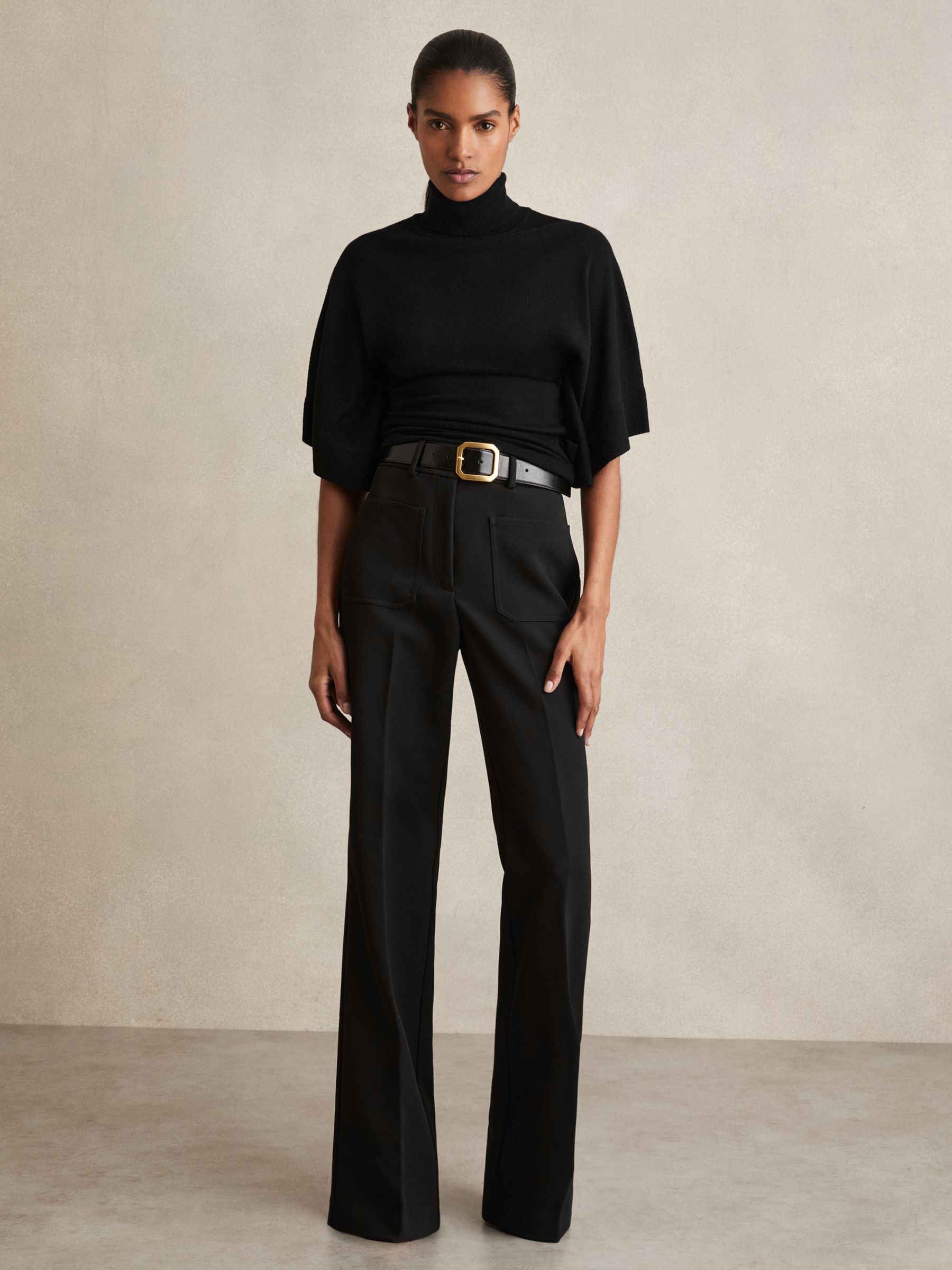 Merino Wool Batwing Roll-Neck Jumper in Black