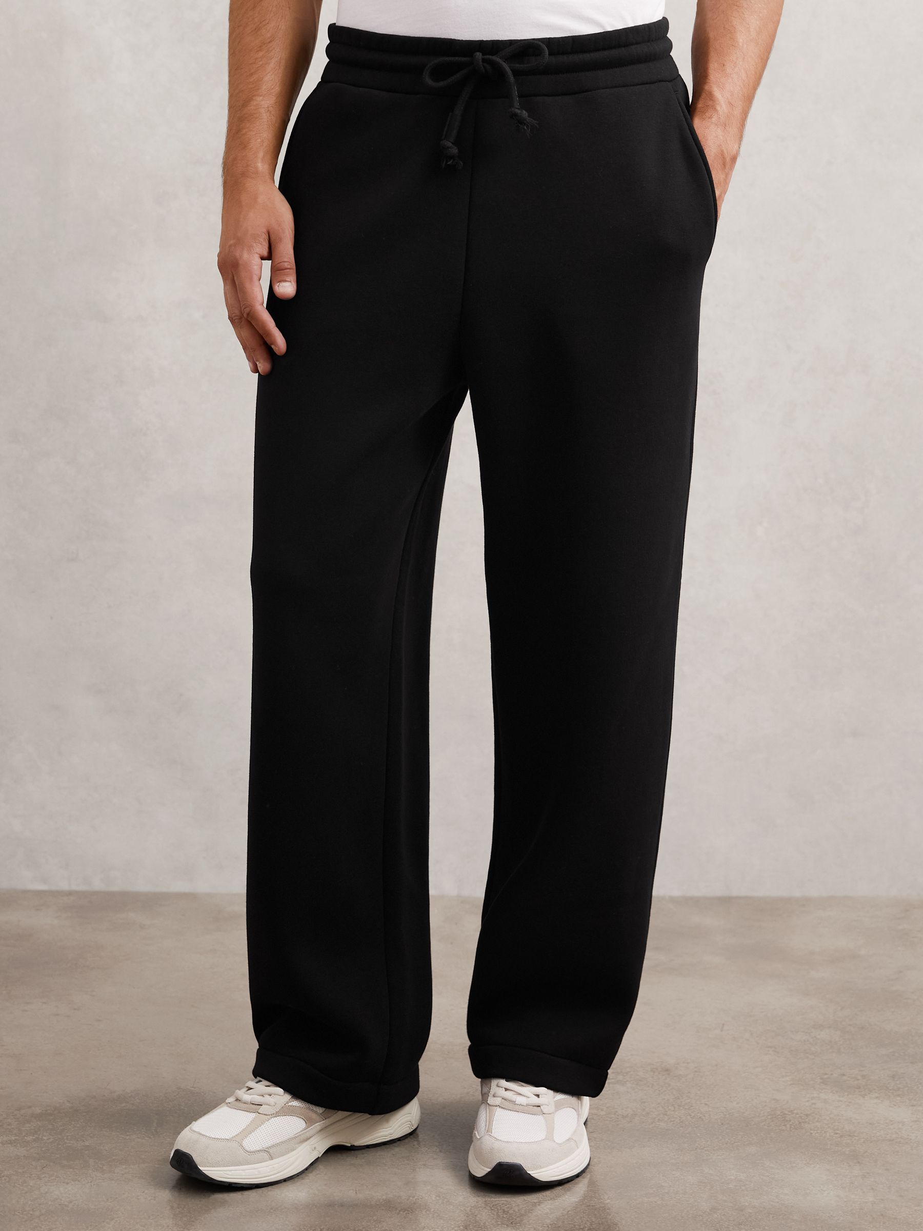 Cotton-Blend Fleece-Back Joggers in Black