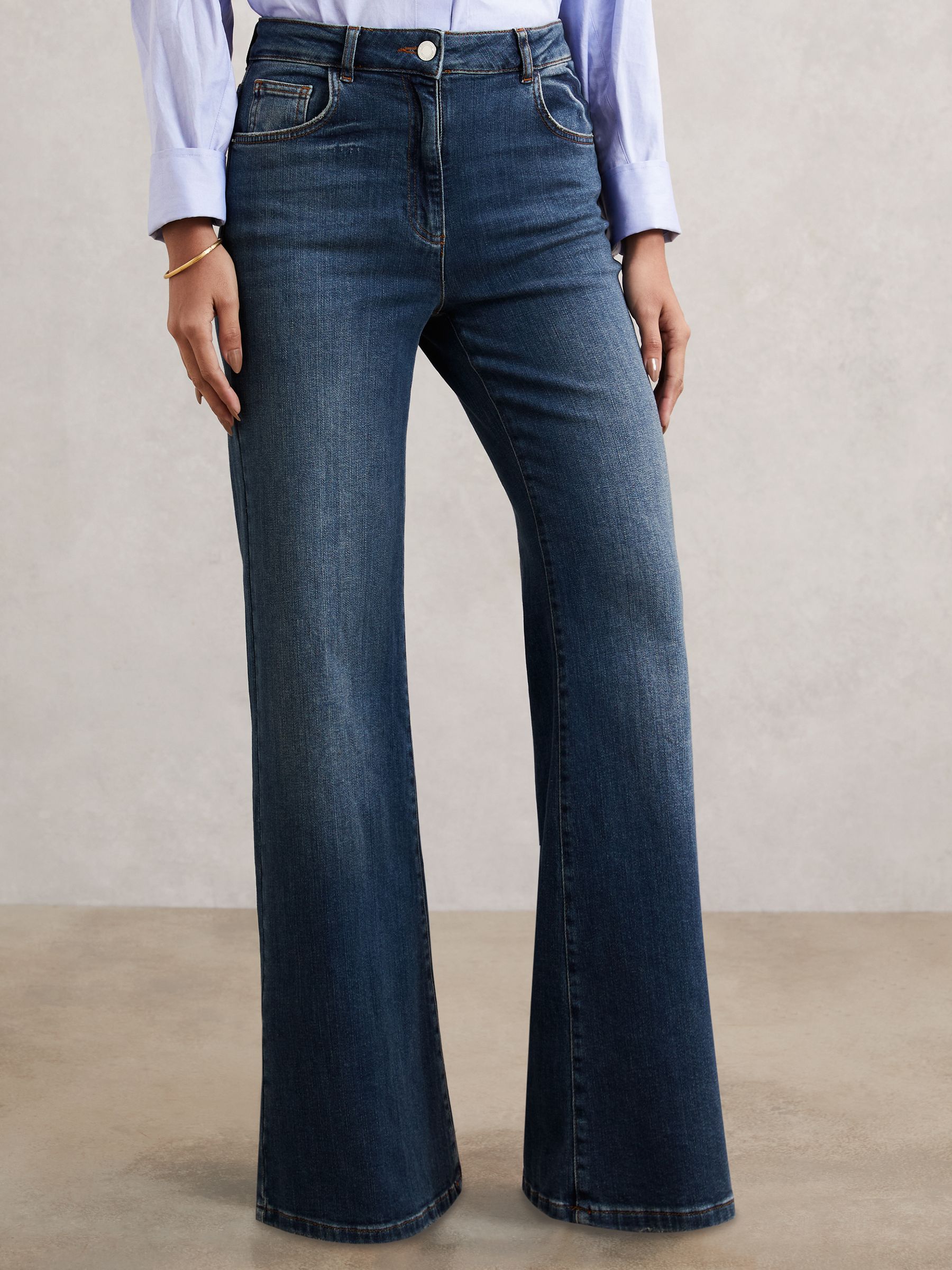Mid-Rise Flared Jeans in Mid Blue
