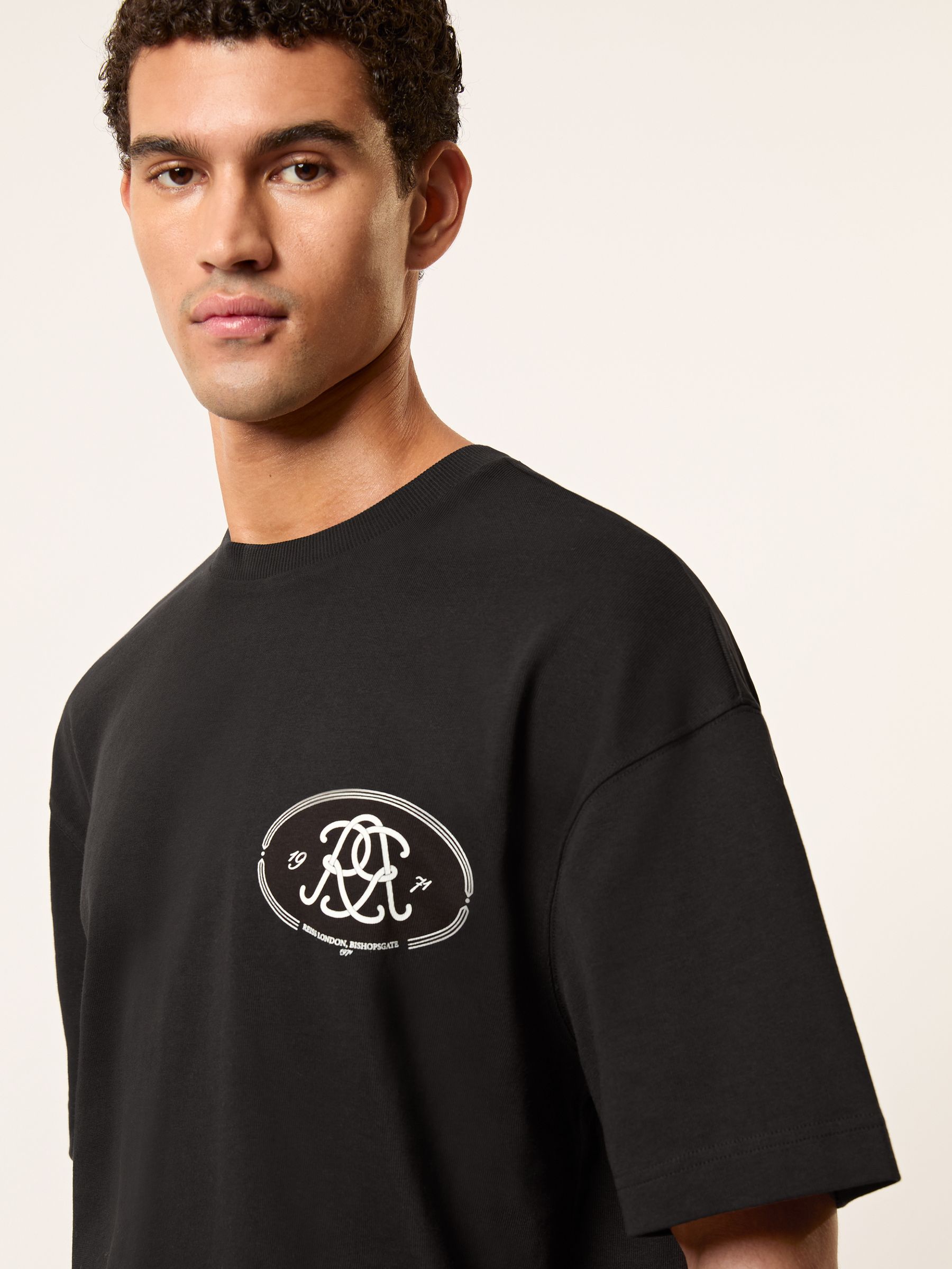 Monogram Print Cotton Oversized T-Shirt in Black