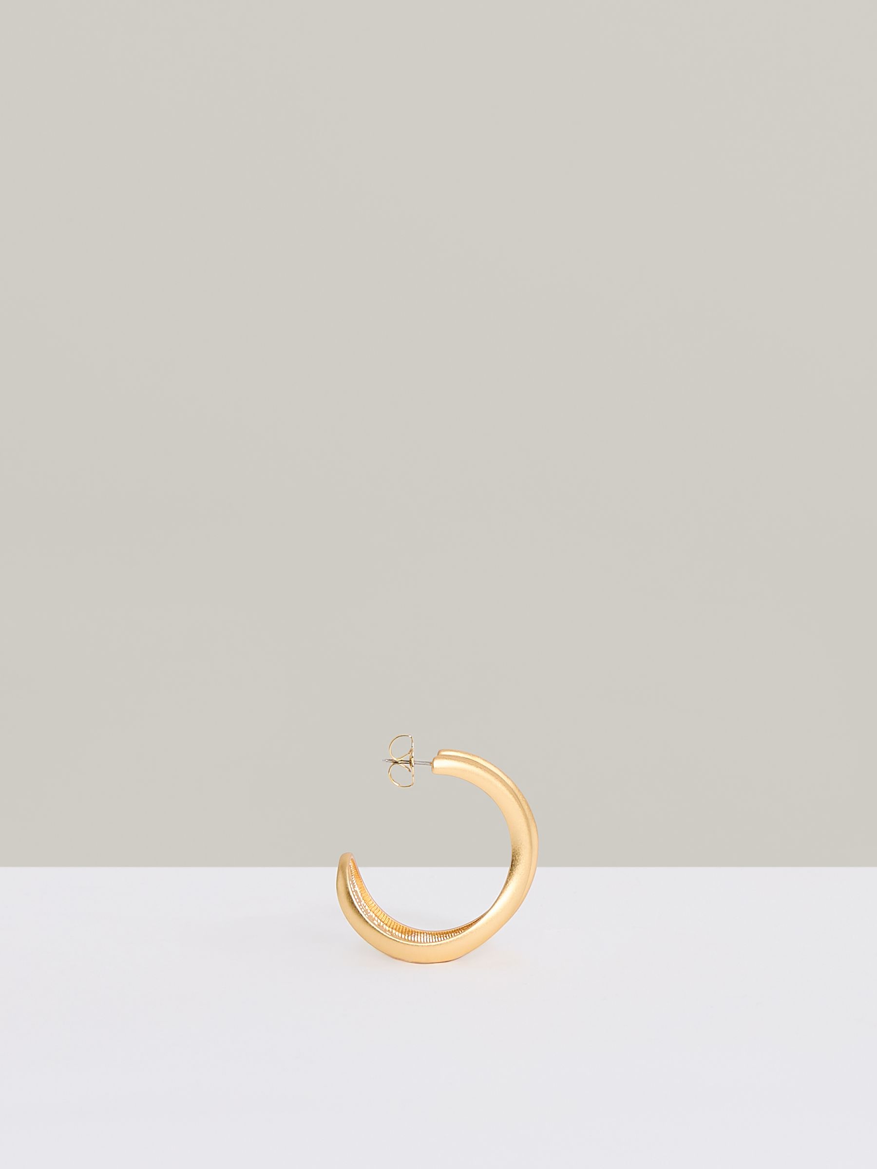 Fluid Hoop Earrings in Gold Tone