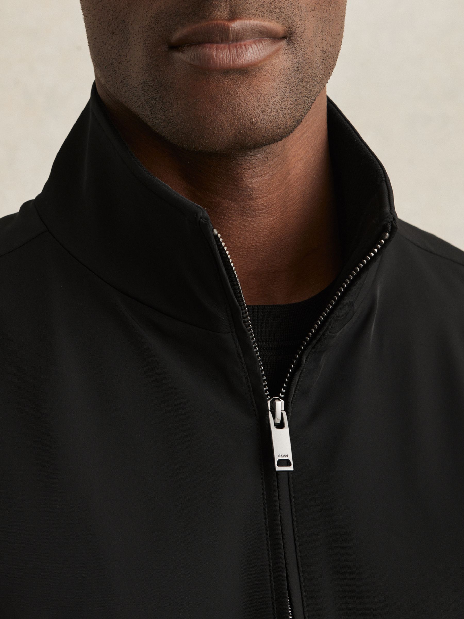 Funnel-Neck Technical Jacket in Black