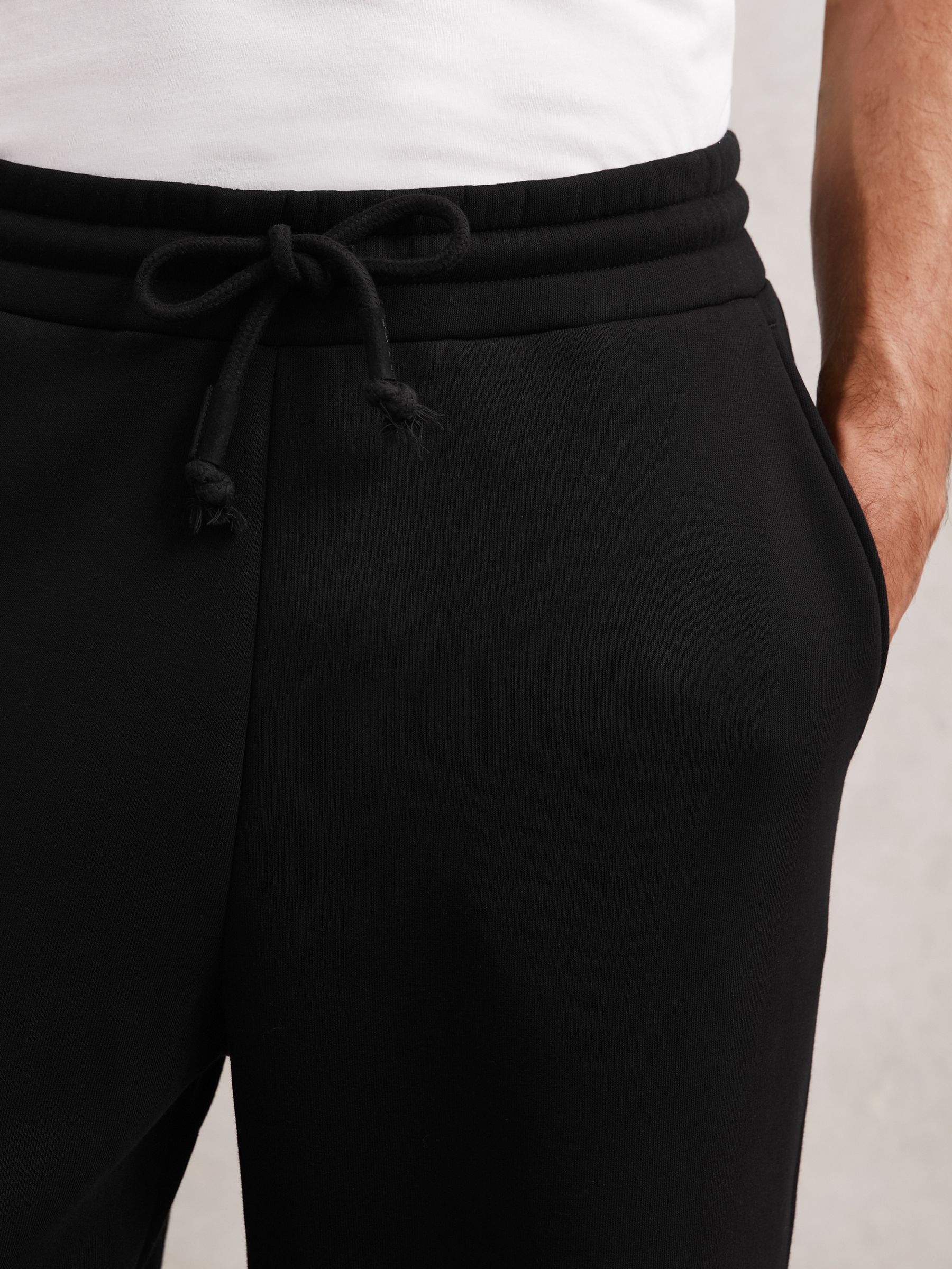 Cotton-Blend Fleece-Back Joggers in Black