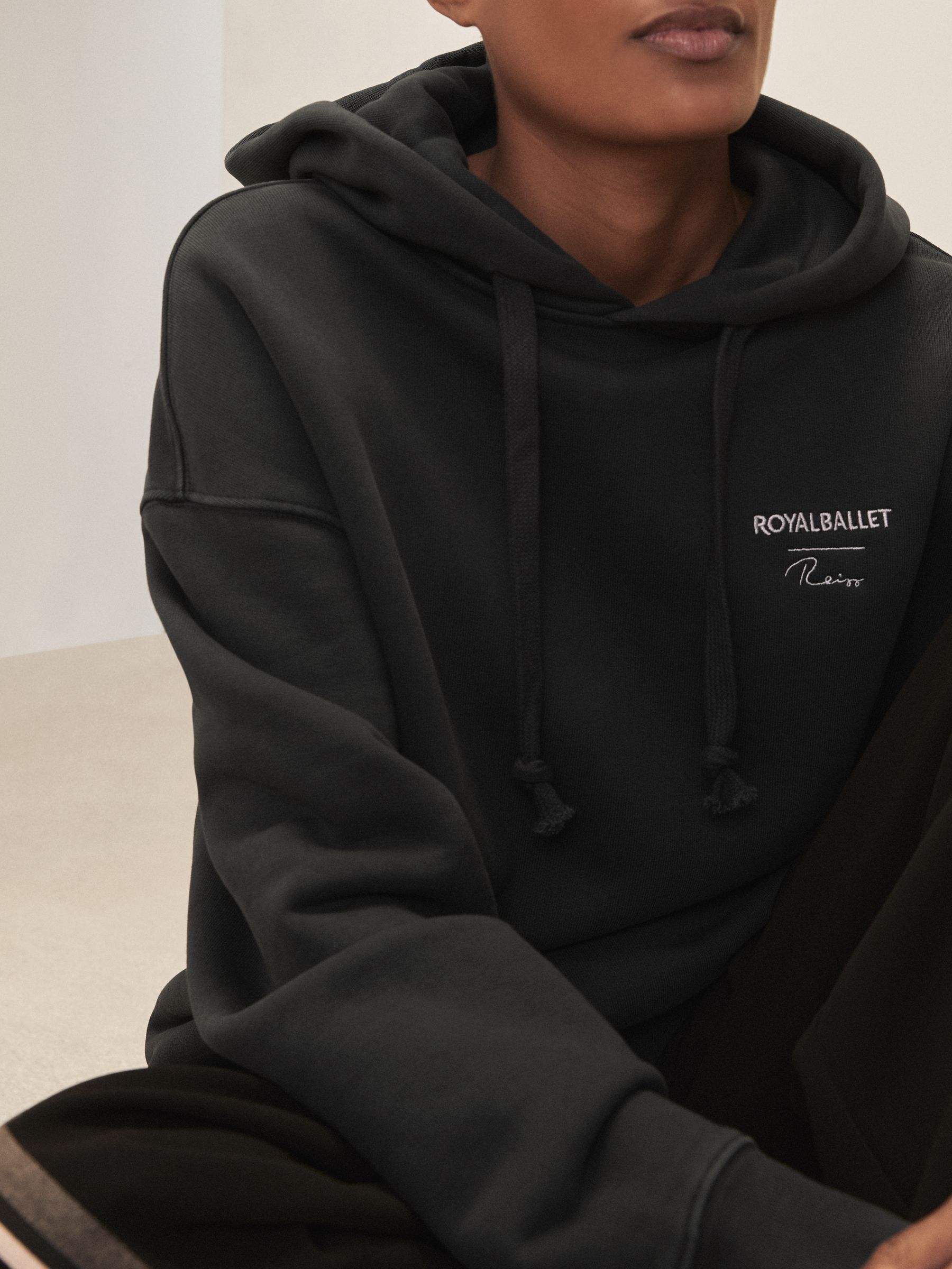Reiss | Royal Ballet Logo Hoodie Unisex Fit in Washed Black