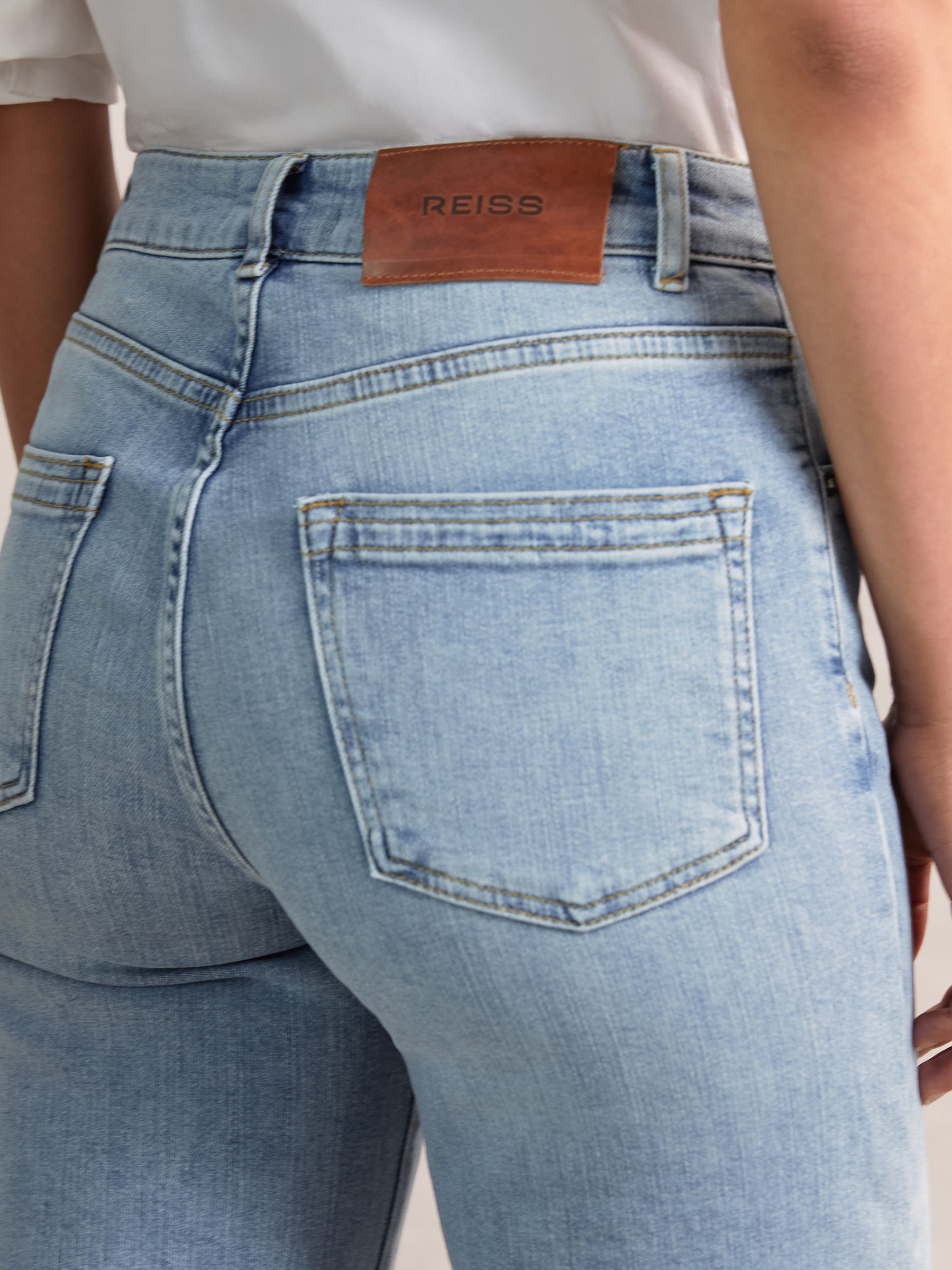 Petite Mid-Rise Flared Jeans in Light Blue