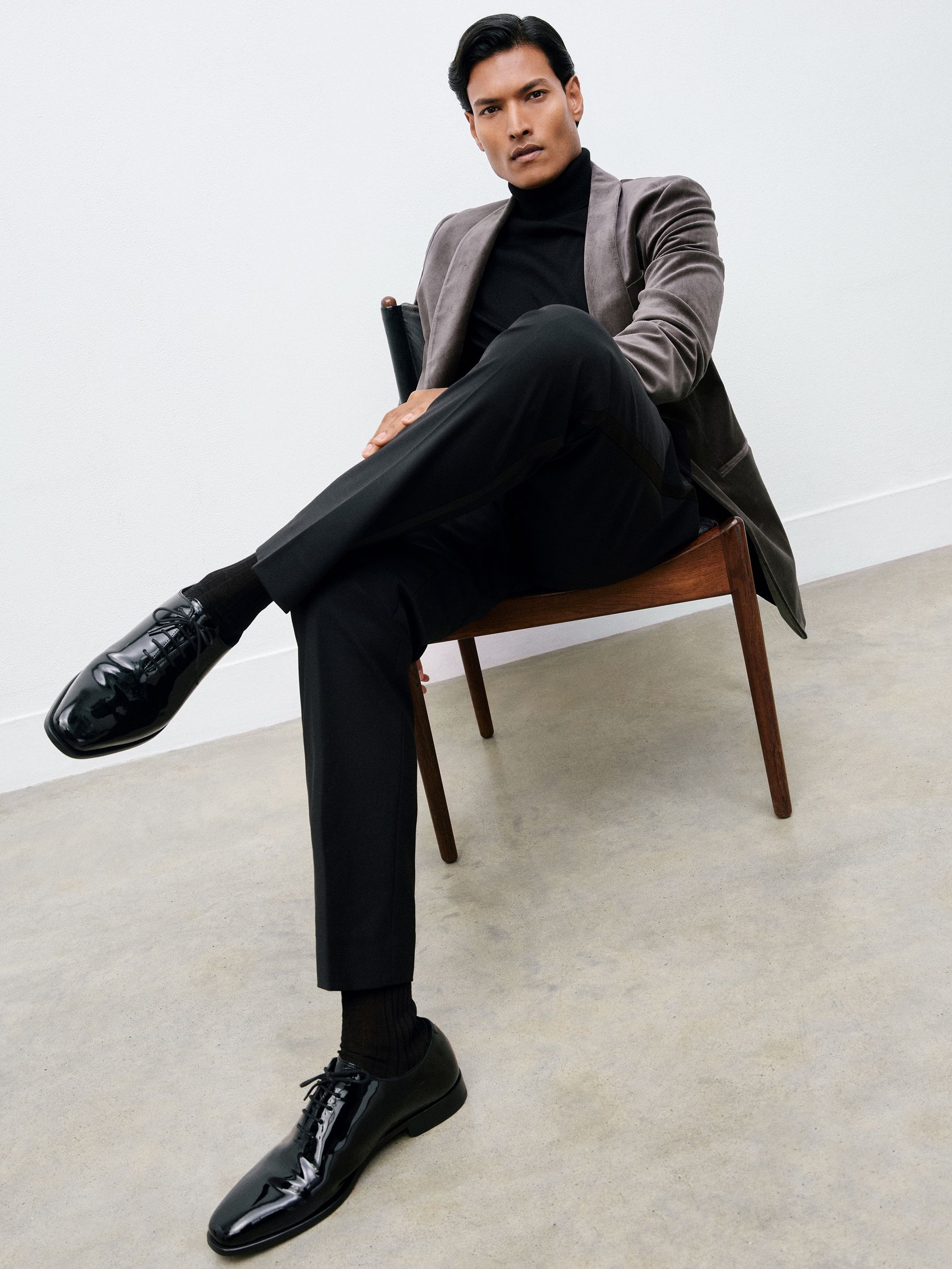 Merino Wool Roll-Neck Jumper in Navy