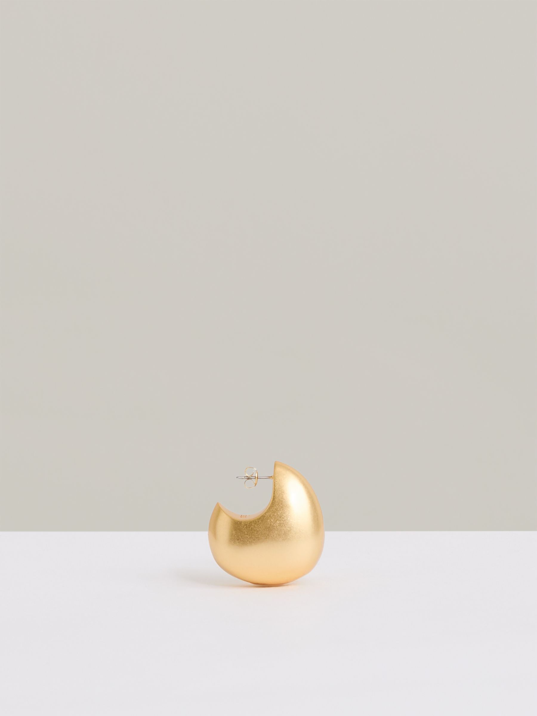 Curve Scoop Earrings in Gold Tone