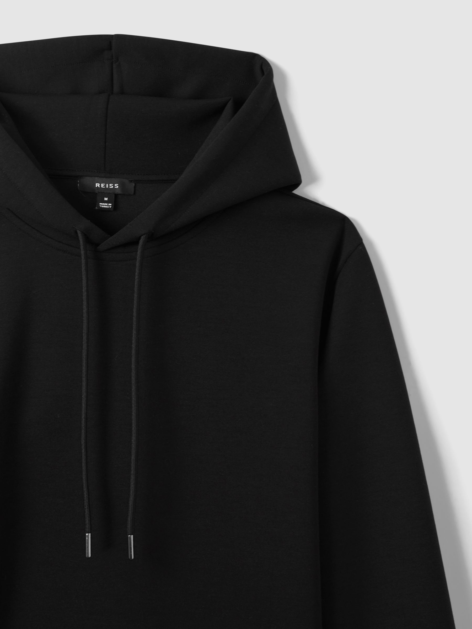 Interlock Jersey Drawstring Hoodie in Black
