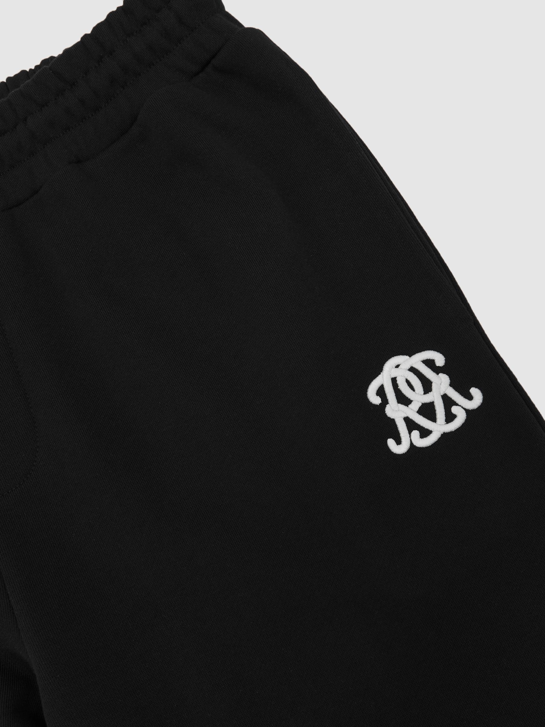 Monogram Cotton Wide-Leg Joggers in Black