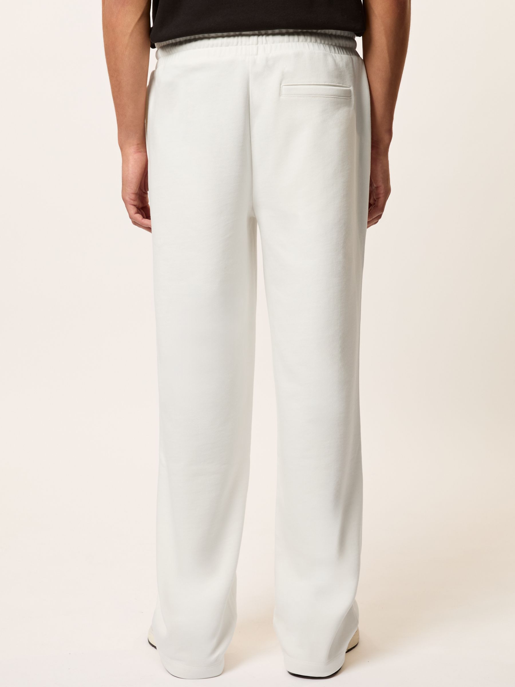Monogram Cotton Wide-Leg Joggers in Off White