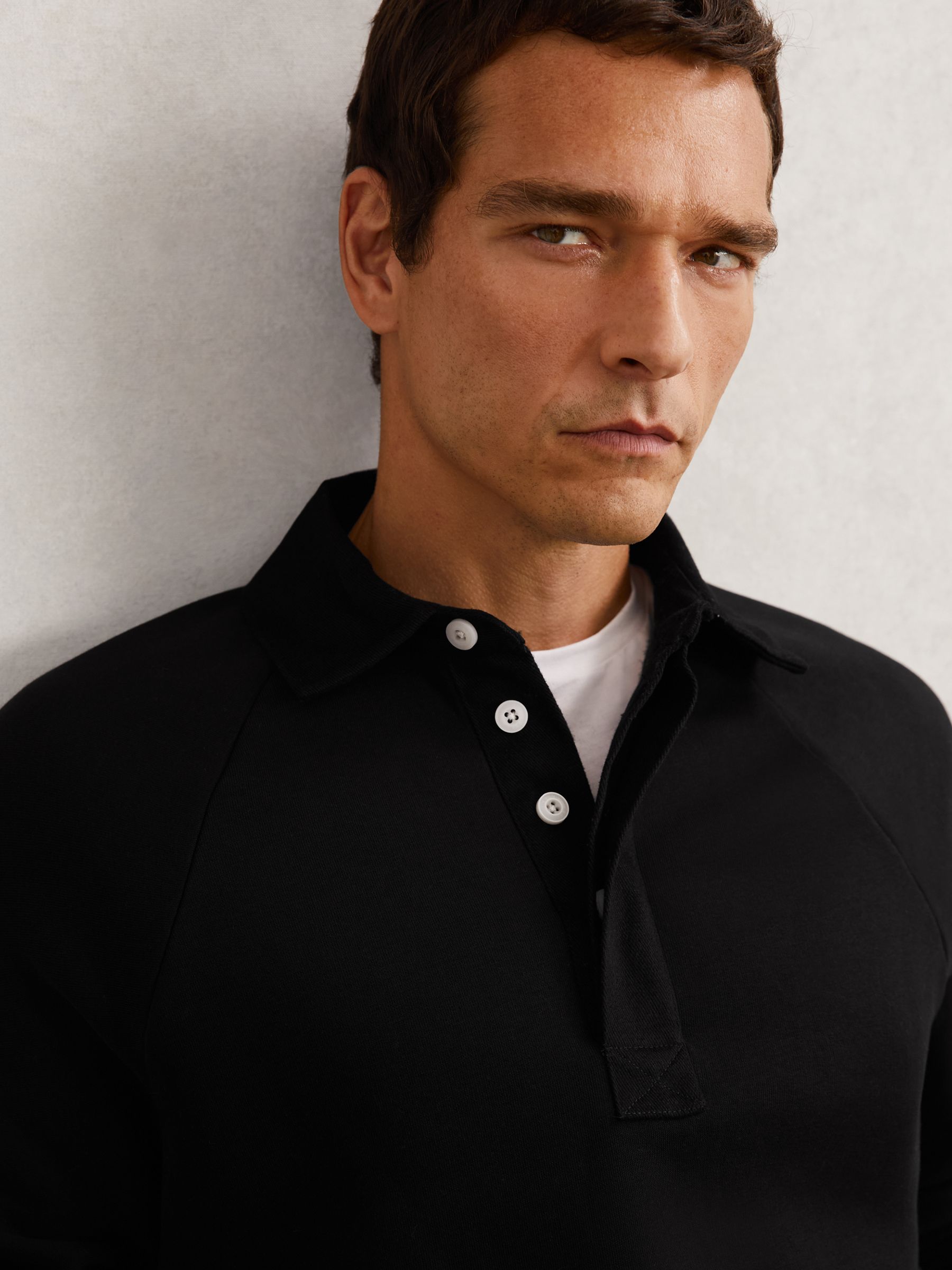 Cotton-Blend Fleece-Back Polo Shirt in Black