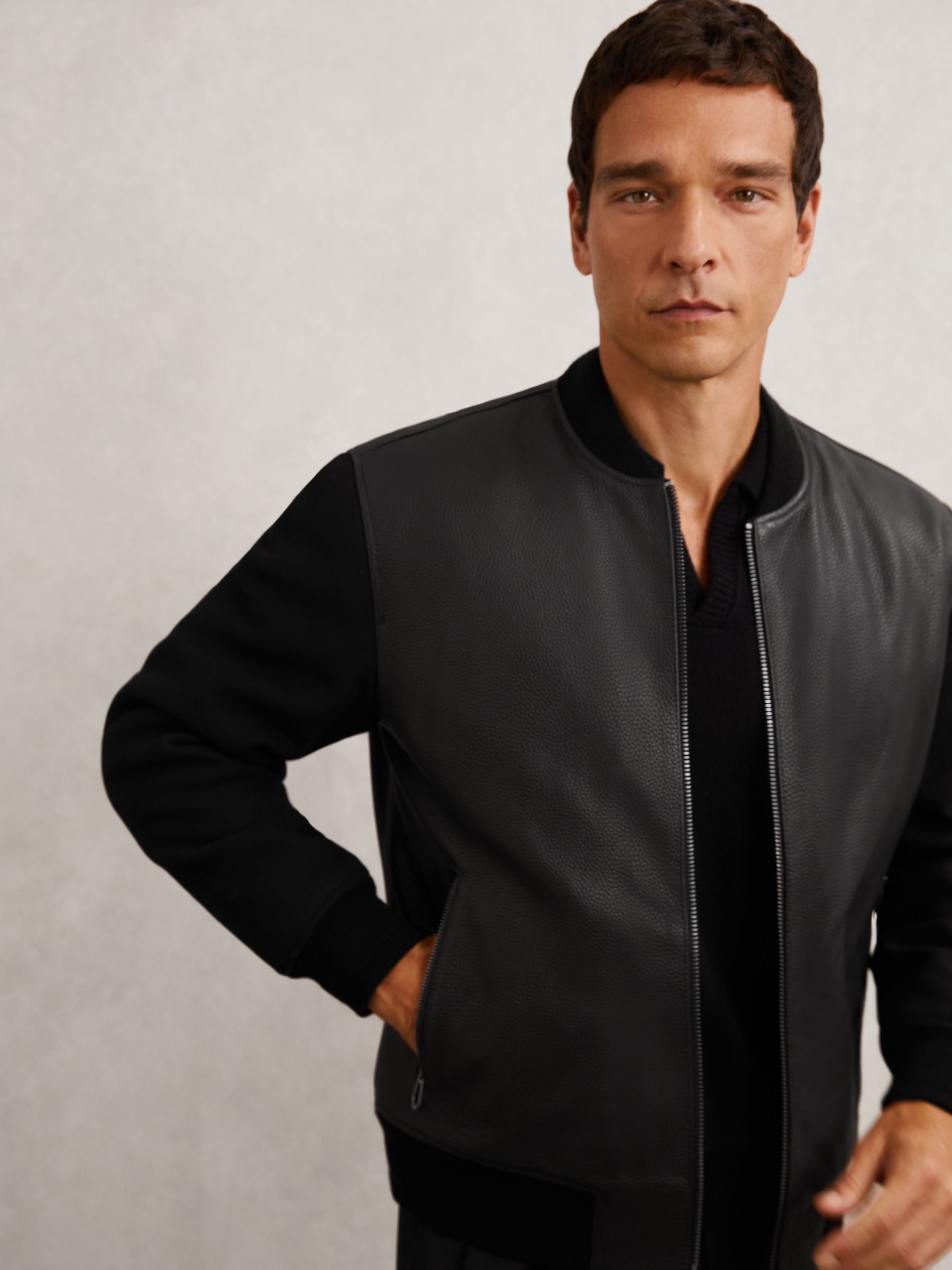 Leather Contrast-Sleeve Bomber Jacket in Black