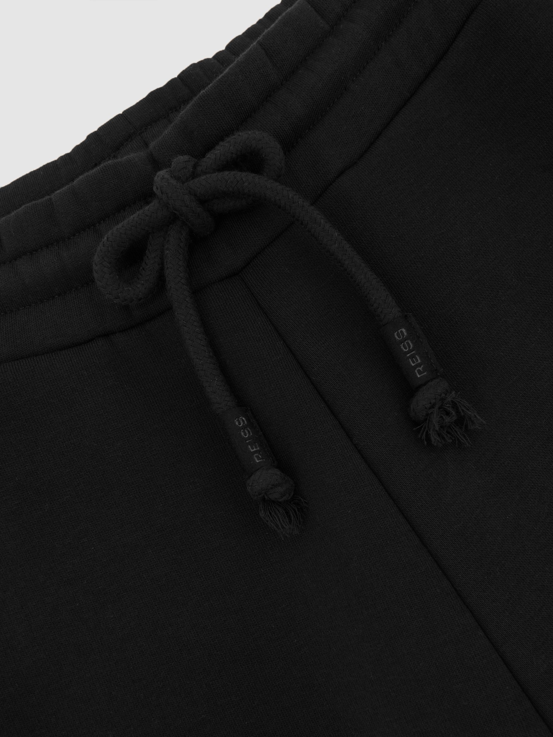 Cotton-Blend Fleece-Back Joggers in Black